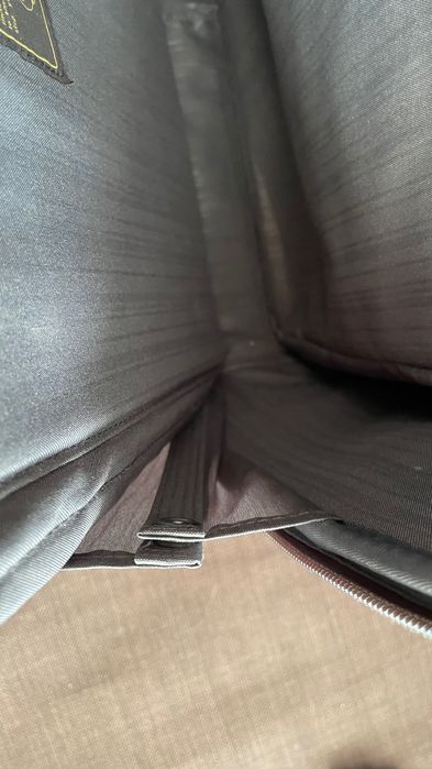 Малък кожен куфар на колелца Samsonite