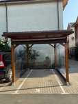Carport auto acoperit cu tabla cutata si inchis cu folie transparenta