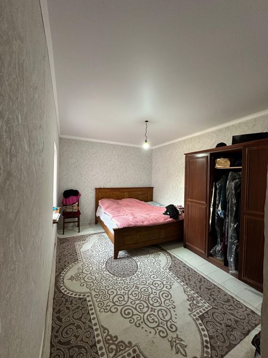 Благоустроенный 2-х этажный дом в микрорайоне "ТАСКЕН", 22,5 сотки.