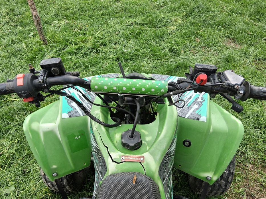 Atv 125cc stare foarte bună pornire la buton preț fix.