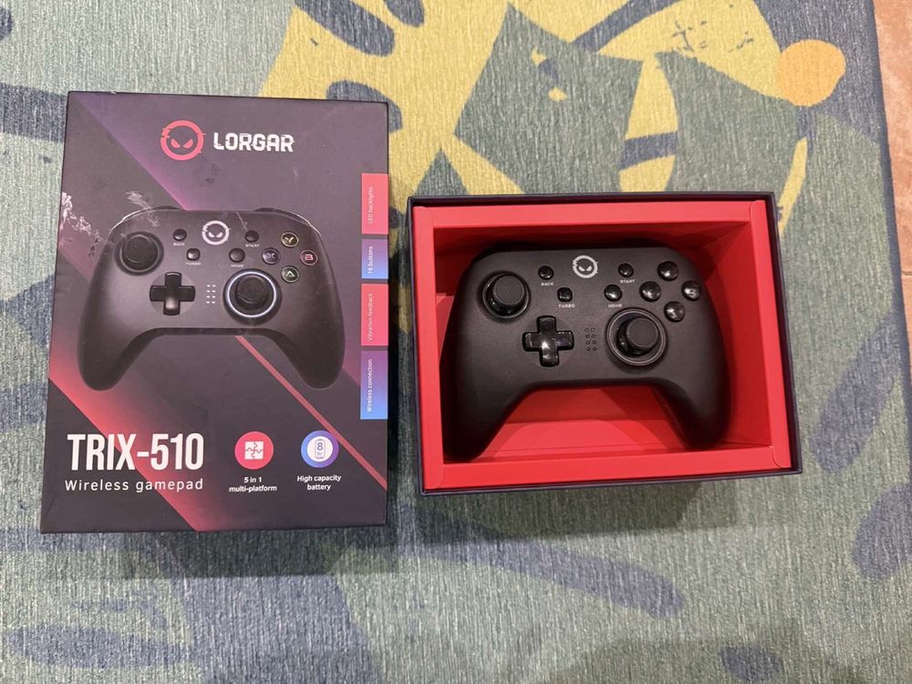 Два Геймпад джойстик -SteelSeries и Game Pad Lorgar Trix -510