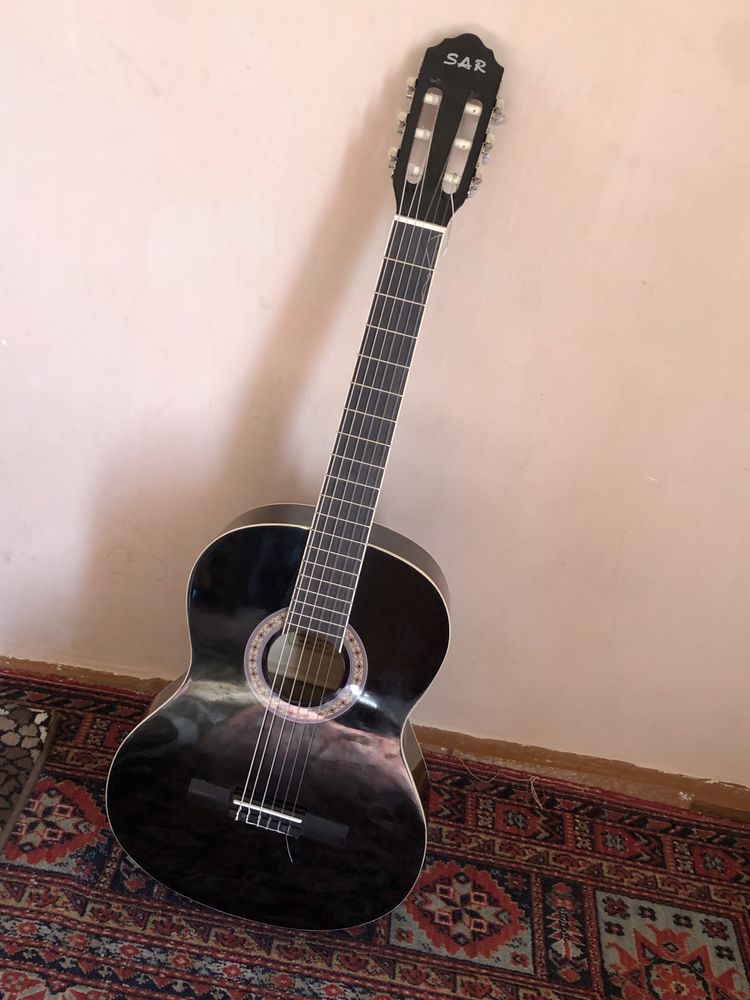 Gitara yangi garantiya bilan