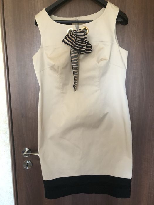 Елегантни рокли Badoo