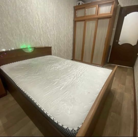 Кровать с тумбочками