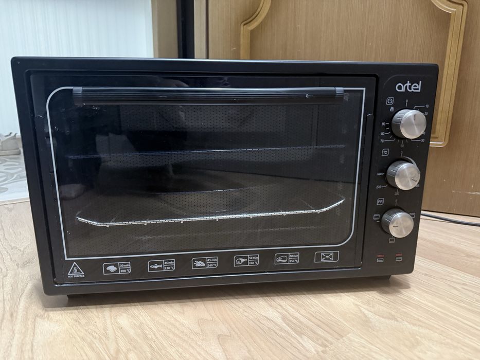 Продам электрическую печь Artel