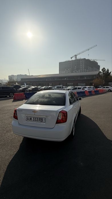 Gentra 2022 yil kraska toza oq benzinda ideal moshina