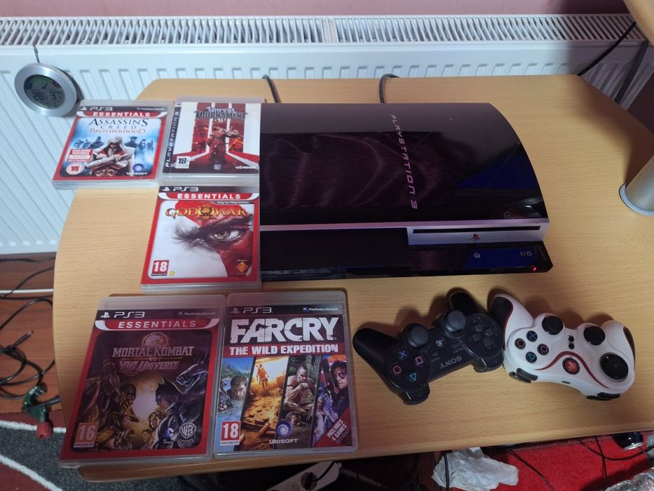 Ps 3 + doua manete si5 jocuri