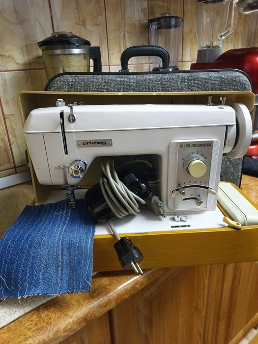 Mașini de cusut electrice