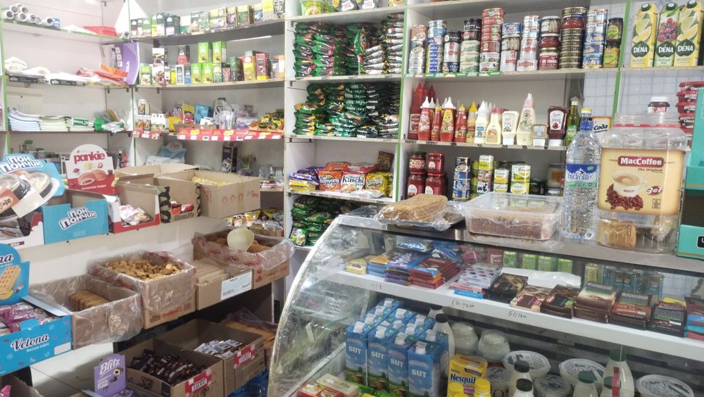 Таййор магазин прадухтаси билан