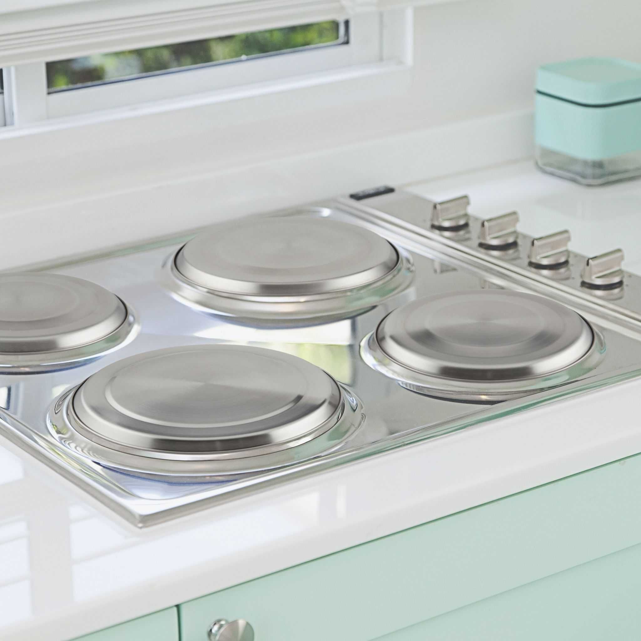Set 4 capace protectie plita si aragaz din inox in 2 marimi 16 + 20 cm