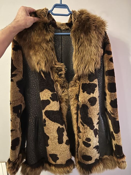 Blana naturala leopard purtata de 2 ori este impecabila