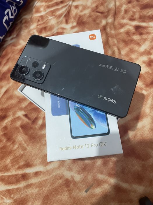Vand telefon  redmi