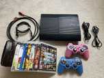 PlayStation 3 super slim + кабели + 24 оригинални игри +Два джойстика
