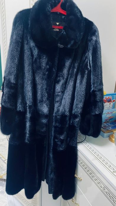Норкавая шуба черный цвет