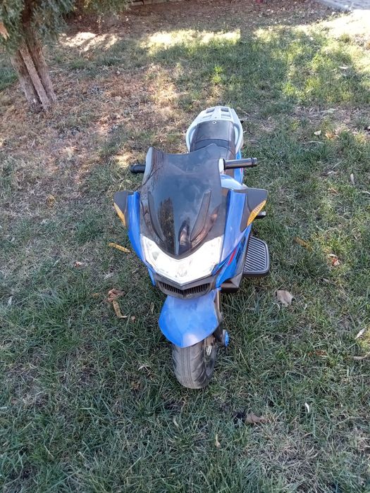 Vând motocicleta electrica copii