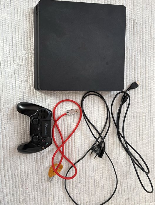 PS4 Slim + 14 jocuri – Stare excelentă