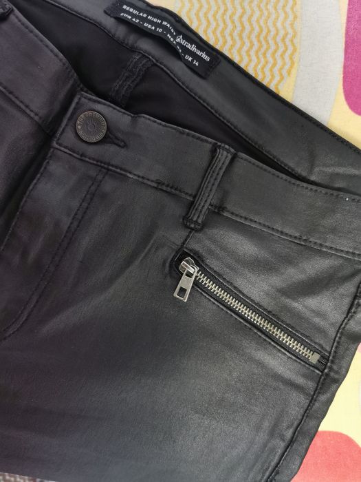 Pantaloni piele femei