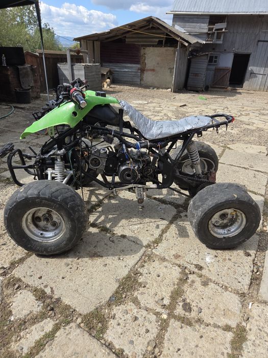 Vand atv 125cc merge impecabil