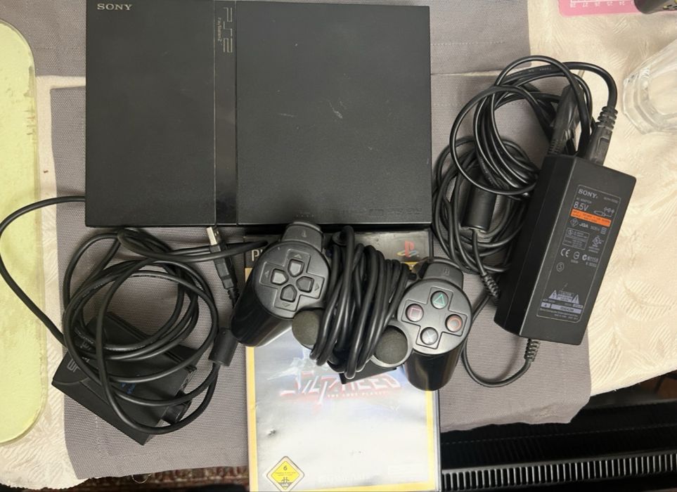 PlayStation 2 Slim/ P2 Slim