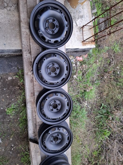 Продавам 4 бр железни джанти 5x100 14 цола 5 J* ЕТ 35 *ц.о 57.1 мм