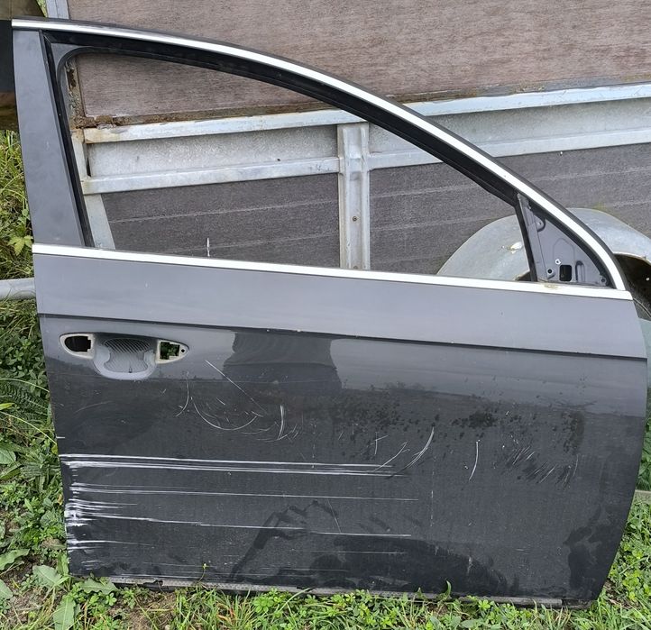 Ușă Passat B7 față dreapta zgâriată .