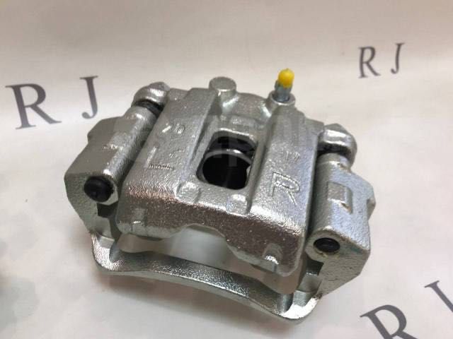 Передний тормозной суппорт на Pajero 4