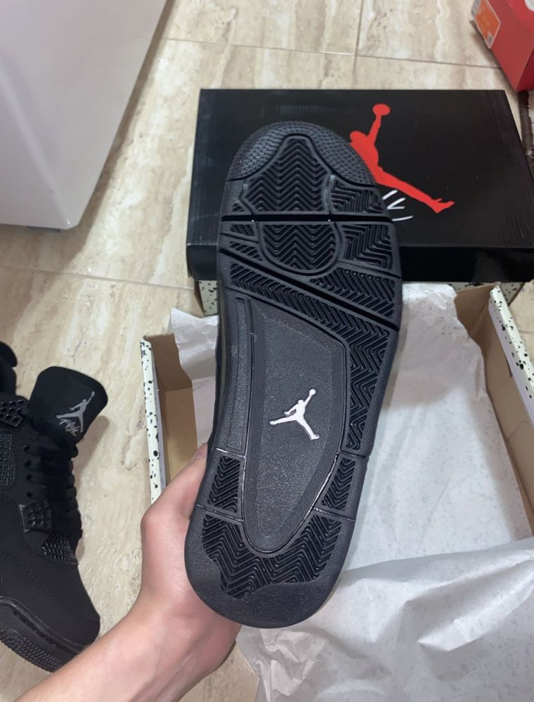 Jordan 4 black cat