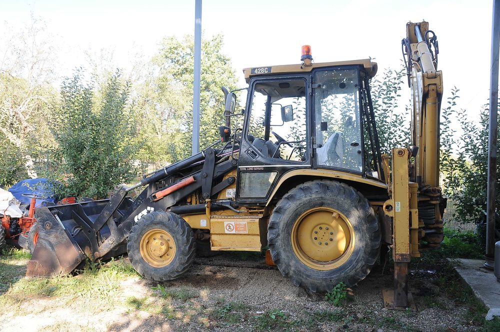 Buldoexcavator Caterpillar 428C an 1998 ore 3.700 acte import Italia