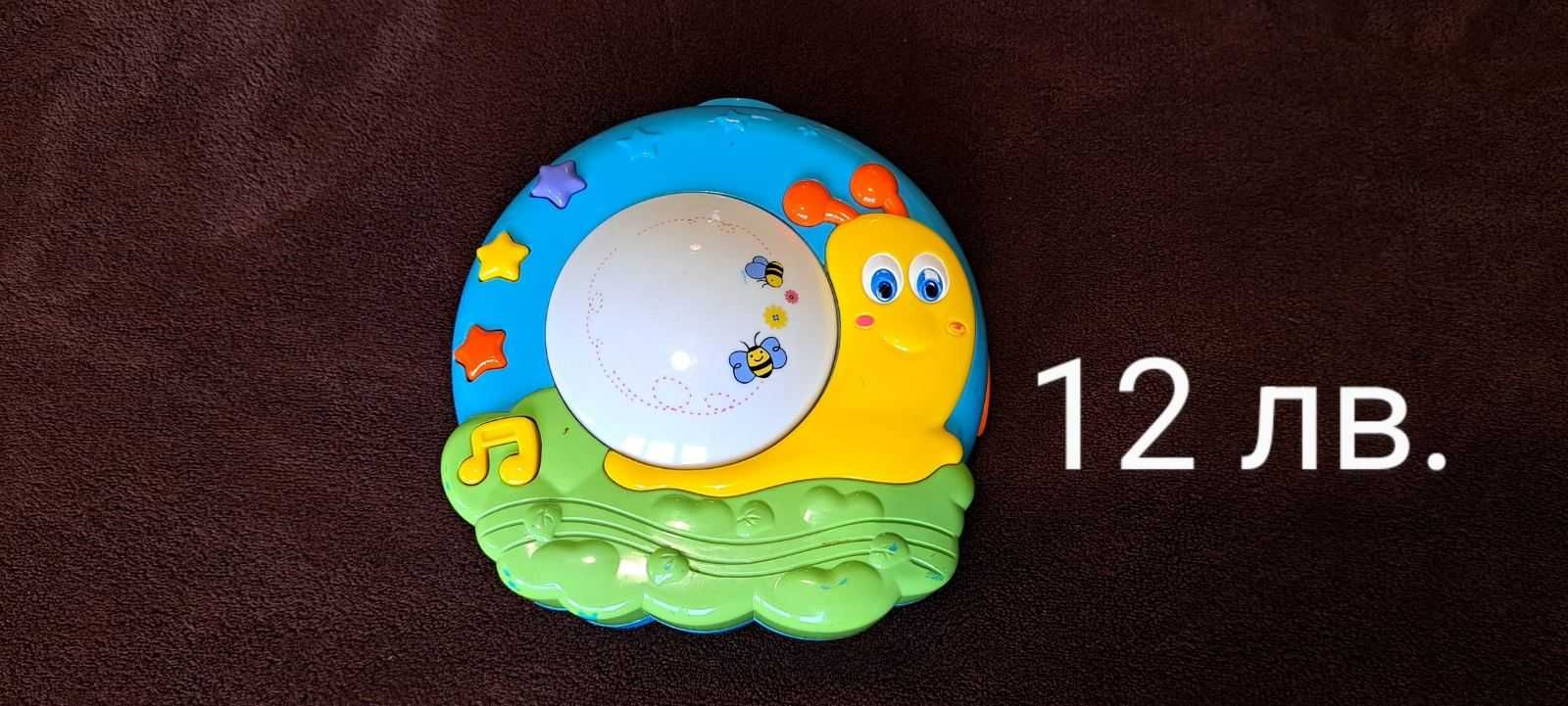 Играчки - дървени низанки, сортери. Прожектор охлюв. Пъзели.