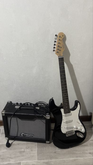 Электрогитара от бренда “Fender Stratocaster”