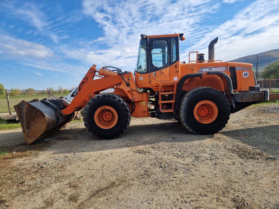 Încărcător frontal, Vola