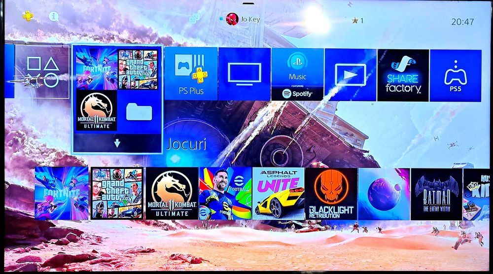 100 jocuri + PS4 SLIM cu Fortnite, GTA V, Mortal Kombat 11 + 2 Manete