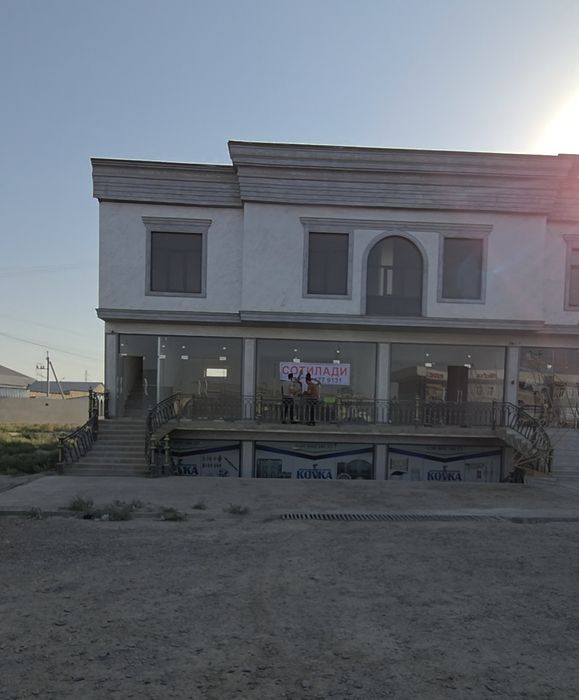 3 qavatli savdo markazi. G'ijduvon markazi Yu.Hamadoniy ko'chasi