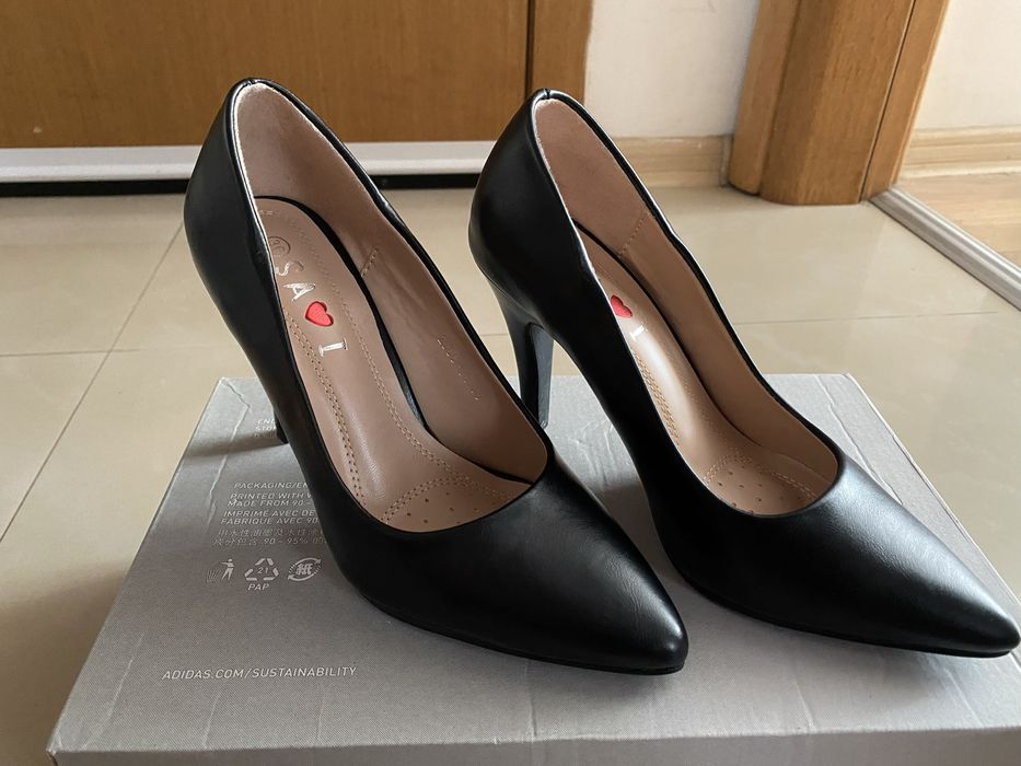 Обувки на висок ток