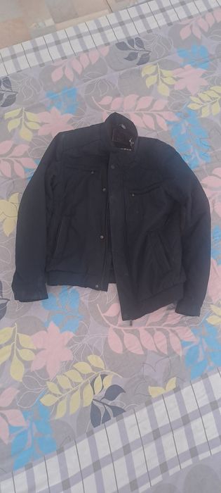 Куртка жыртылмаған таза