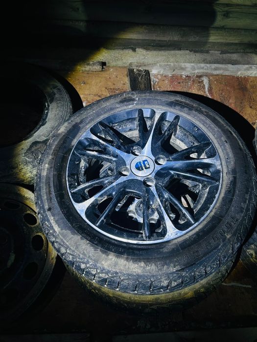 Продам титановые диски и резину на 14