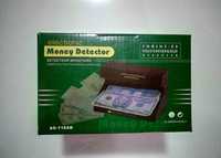 Настолен UV детектор за разпознаване улавяне на фалшиви банкноти.