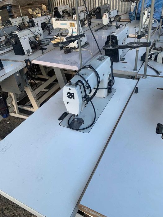 Masini de cusut cu masa