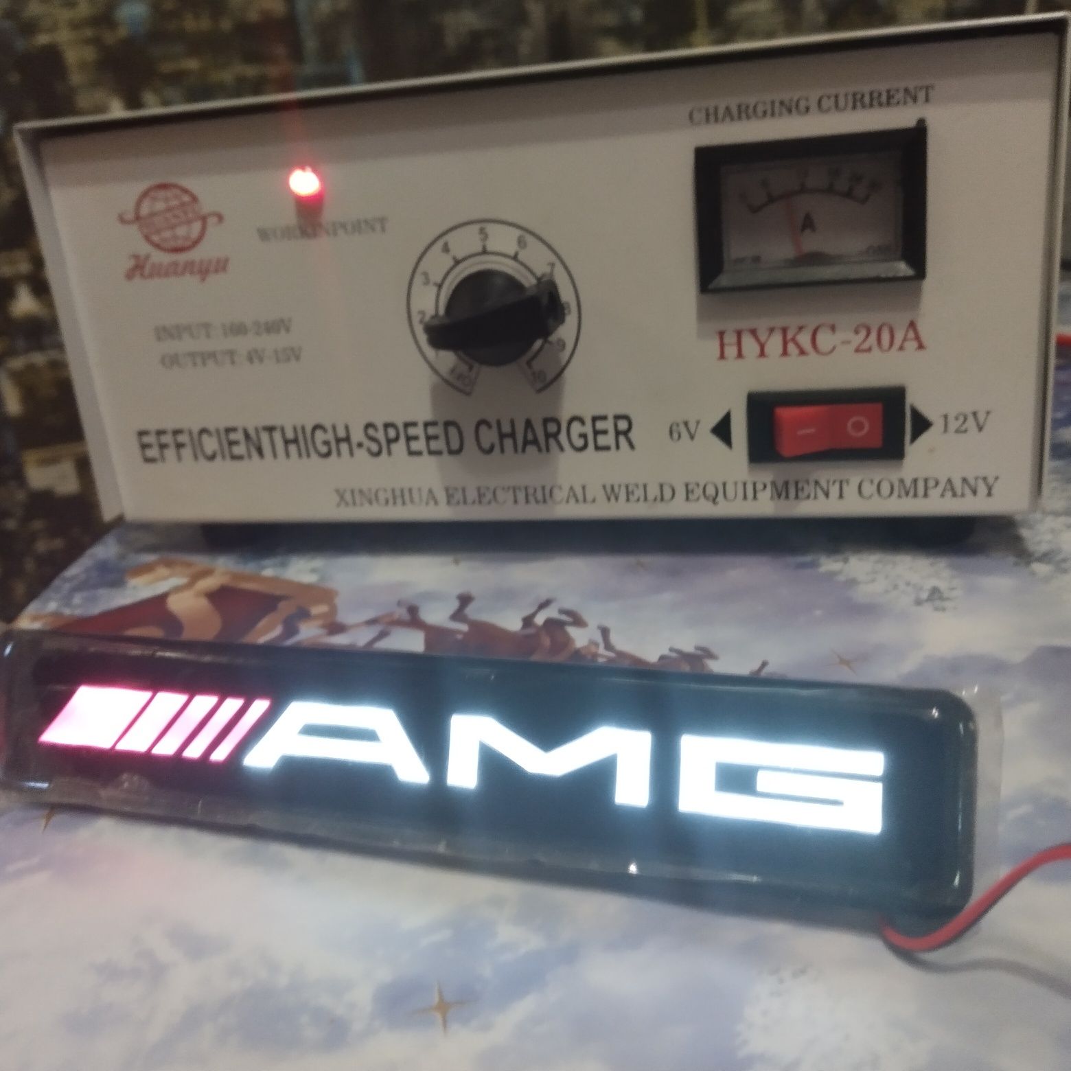 Светящаяся AMG эмблема на решетку радиатора