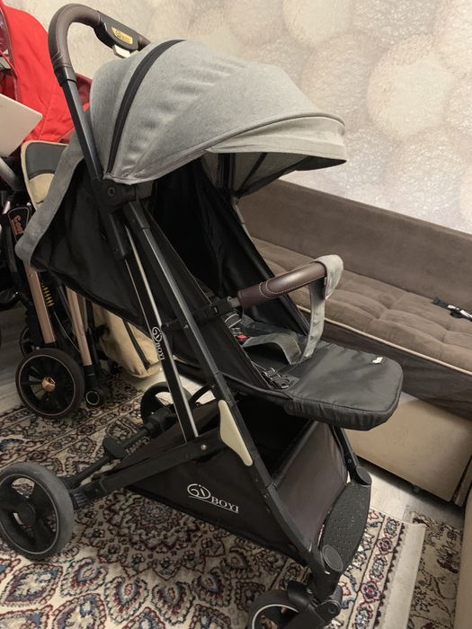 Продам детскую коляску чемодан Boyi
