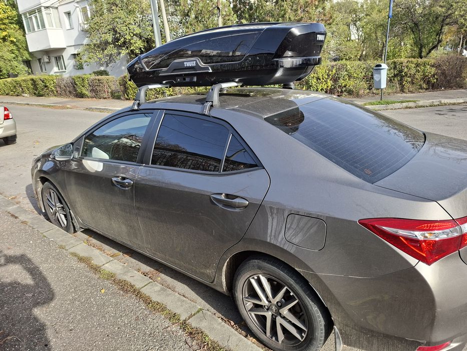 Vând Thule   motion XT sport black.