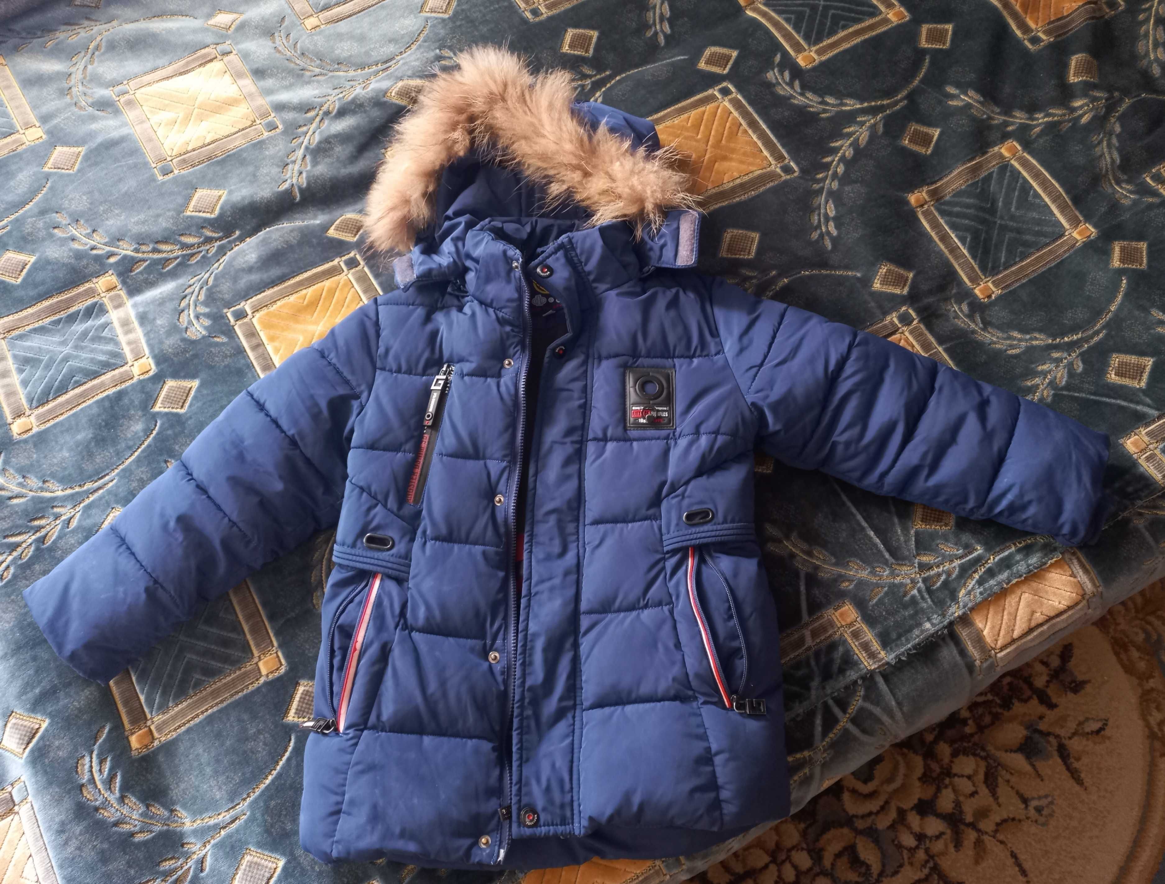Продам куртку на мальчика 6-8 лет зимнюю