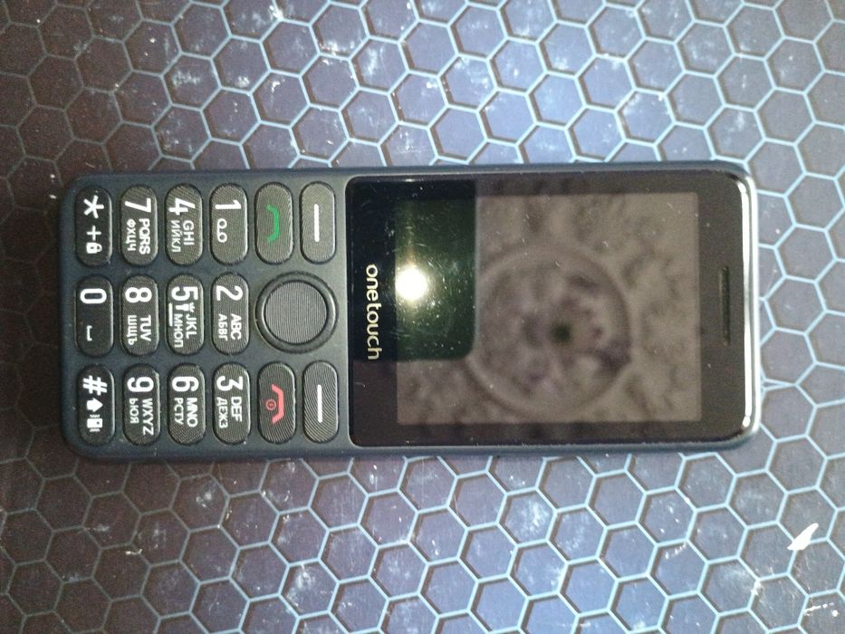 Телефон One touch