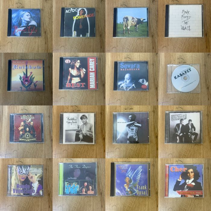 CD дисков  AC/DC, Pink Floyd, Mariah Carey, Bryan Adams и другие