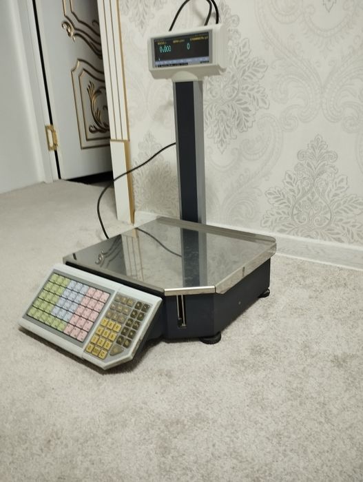 Электронный чек чикарувчи тарози