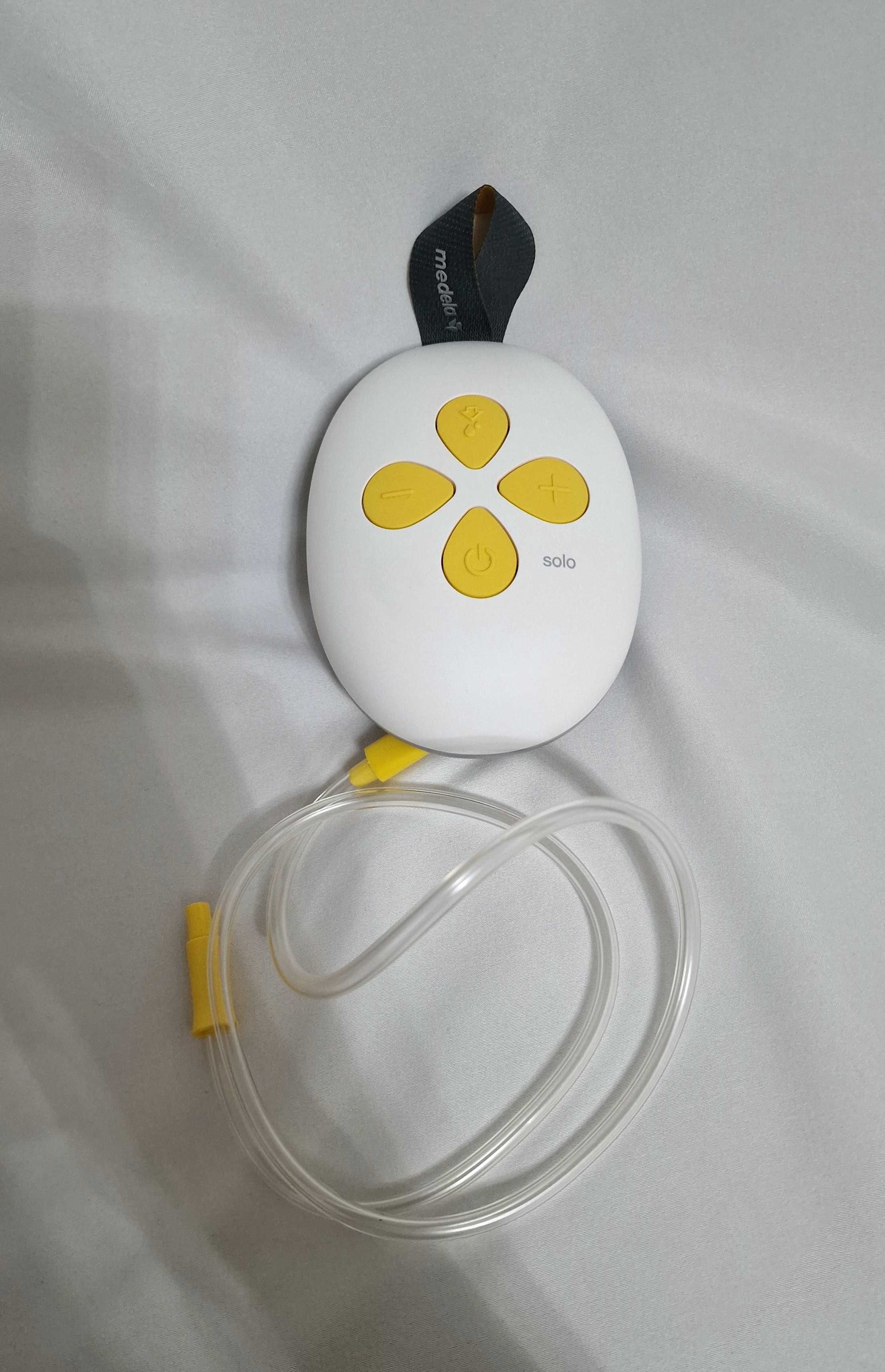 Medela -  двуфазна електрическа помпа за кърма