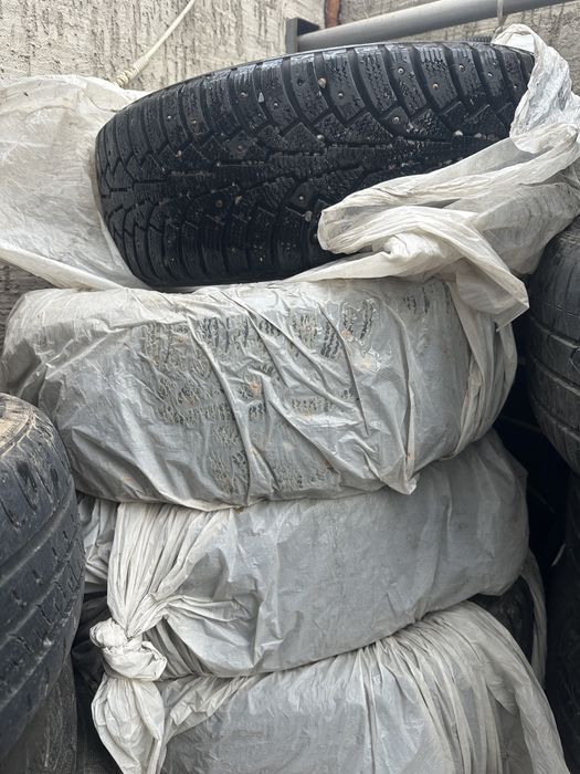 Купи шину б/у  зимний шипованый