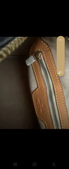 Louis vuitton este in stare foarte buna