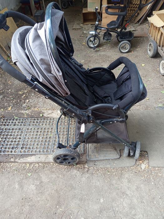 Срочно в связи с переездом коляска детская серого цвета