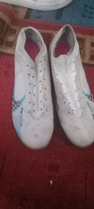 NGhete de fotbal Nike Zoom Mercurial Vapor 15 Elite FG - Alb
Ghete Fot